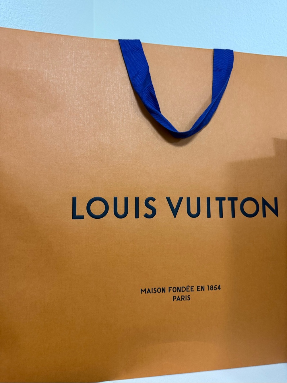 Louis Vuitton Orange Retail Bag with Blue Ribbon Handles